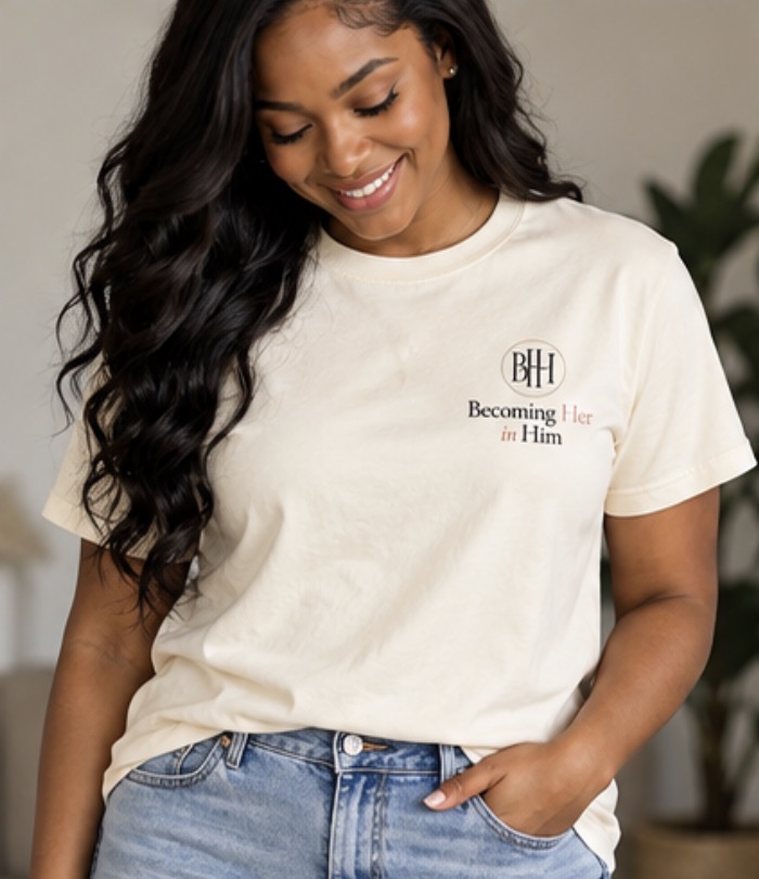 Model wearing the cream Becoming Her in Him tee, front view
